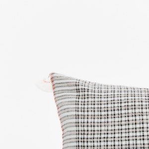 A soft ivory pillow in 18x18 inch size featuring a fawn and indigo checkered weave. Handcrafted by Ginger Sparrow, a modern home decor brand. 