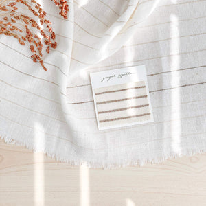 Handwoven Textile by Ginger Sparrow, a modern home decor brand. Featuring a brown thick stripe woven on a soft ivory ground. Light and airy its perfect for #throwpillows #drapes #livingroomdecor #bedroomideas