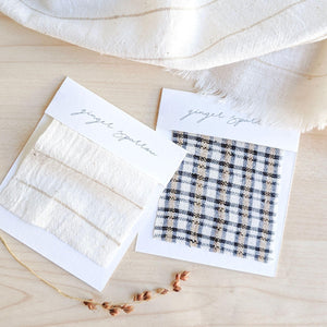 Handwoven Textile by Ginger Sparrow, a modern home decor brand. Featuring a fawn and indigo checkered weave. Light and airy its perfect for #throwpillows #drapes #livingroomdecor #bedroomideas