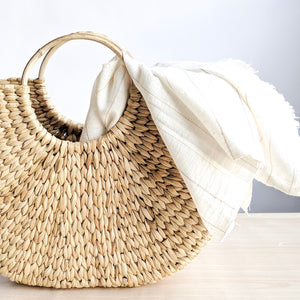 A water grass baskets featuring a striking arc silhouette. Shelf basket. Market basket, beach basket, basket bag. Spring vibe. Buttery Golden Hue. 