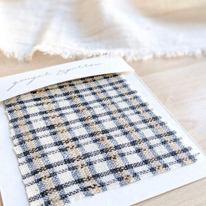 Handwoven Textile by Ginger Sparrow, a modern home decor brand. Featuring a fawn and indigo checkered weave. Light and airy its perfect for #throwpillows #drapes #livingroomdecor #bedroomideas