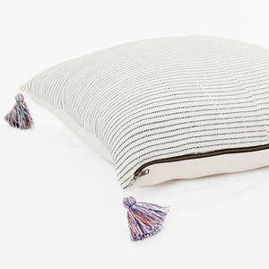 Throw pillow by Ginger Sparrow, a modern handcrafted home decor brand. Featuring a rich cream base with ticking stripes in black. Finished with fluffy cotton tassels for some extra lush. 