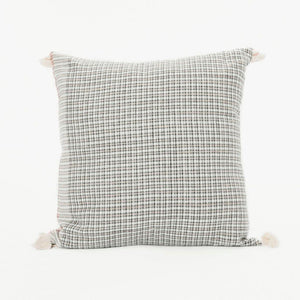 A soft ivory pillow in 18x18 inch size featuring a fawn and indigo checkered weave. Handcrafted by Ginger Sparrow, a modern home decor brand. 