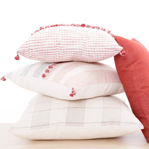 Throw pillow by Ginger Sparrow, a modern handcrafted home decor brand. The pillow features a soft ivory and dusty sage base with air geometric lines in a grid pattern. 