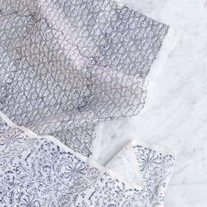 Hand block printed Textile by Ginger Sparrow, a modern home decor brand. Featuring a delicate floral pattern in three color options - olive grey, tan and pale blue. Light and airy its perfect for #throwpillows #drapes #livingroomdecor #bedroomideas #upholsteryfabric #fabricbytheyard