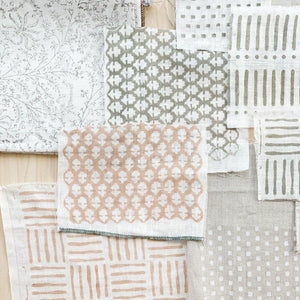 Hand block printed Textile by Ginger Sparrow, a modern home decor brand. Featuring a delicate floral pattern in three color options - olive grey, tan and pale blue. Light and airy its perfect for #throwpillows #drapes #livingroomdecor #bedroomideas #upholsteryfabric #fabricbytheyard