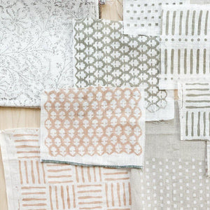 Hand block printed Textile by Ginger Sparrow, a modern home decor brand. Featuring a delicate floral pattern in three color options - olive grey, tan and pale blue. Light and airy its perfect for #throwpillows #drapes #livingroomdecor #bedroomideas #upholsteryfabric #fabricbytheyard