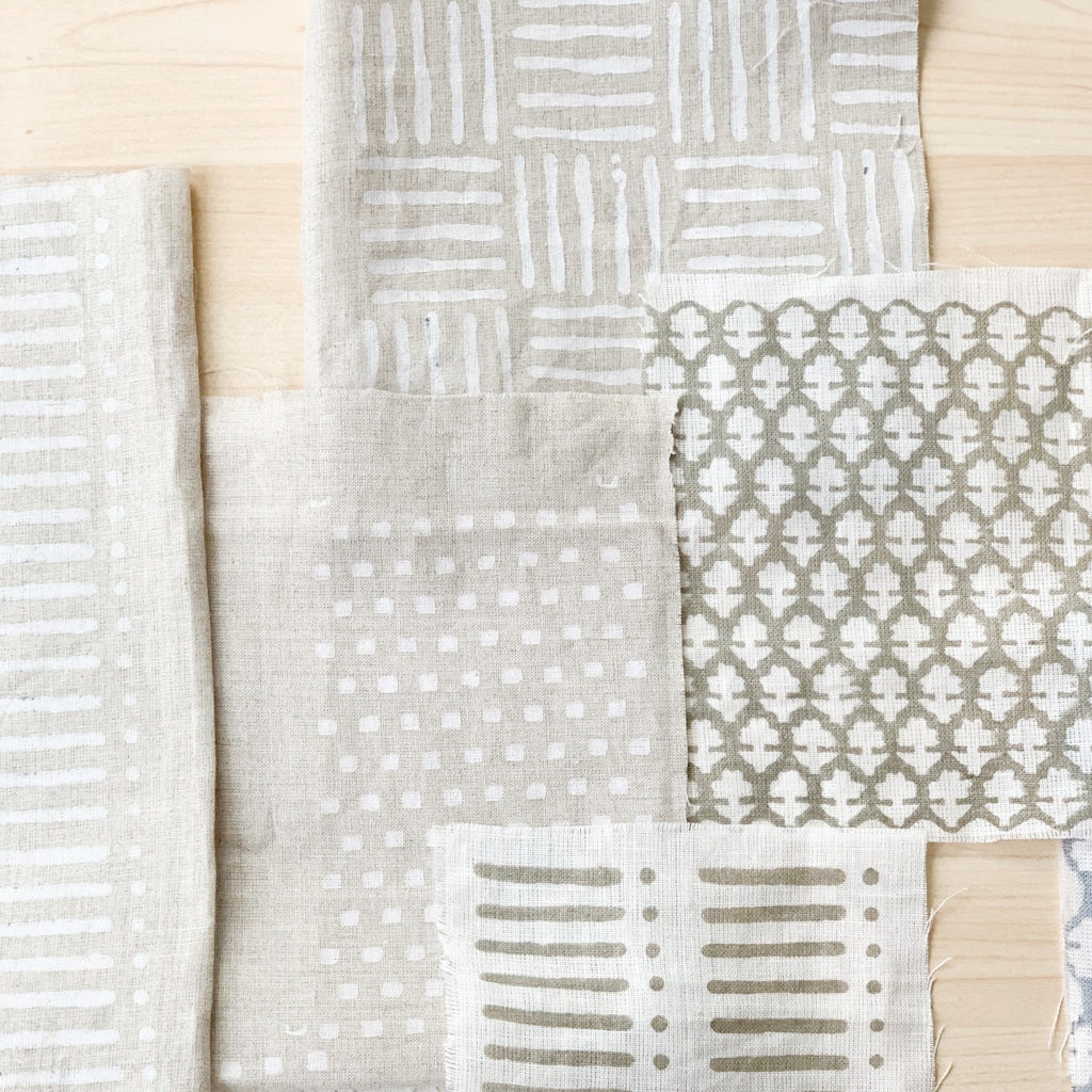Hand block printed Textile by Ginger Sparrow, a modern home decor brand. Featuring a delicate floral pattern in three color options - olive grey, tan and pale blue. Light and airy its perfect for #throwpillows #drapes #livingroomdecor #bedroomideas #upholsteryfabric #fabricbytheyard