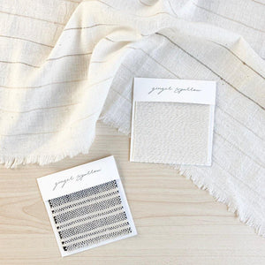 Handwoven Textile by Ginger Sparrow, a modern home decor brand. Featuring a heavyweight black and white striped fabric woven on a handloom. Sturdy and heavyeight its perfect for #throwpillows #drapes #livingroomdecor #bedroomideas