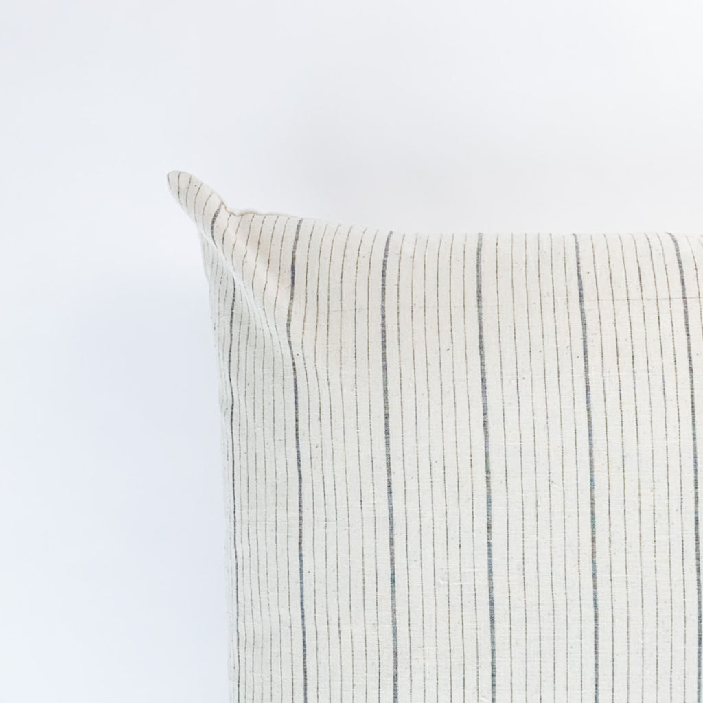 Handwoven Textile by Ginger Sparrow, a modern home decor brand. Featuring a charcoal black stripe pattern woven on a soft ivory ground. Light and airy its perfect for #throwpillows #drapes #livingroomdecor #bedroomideas