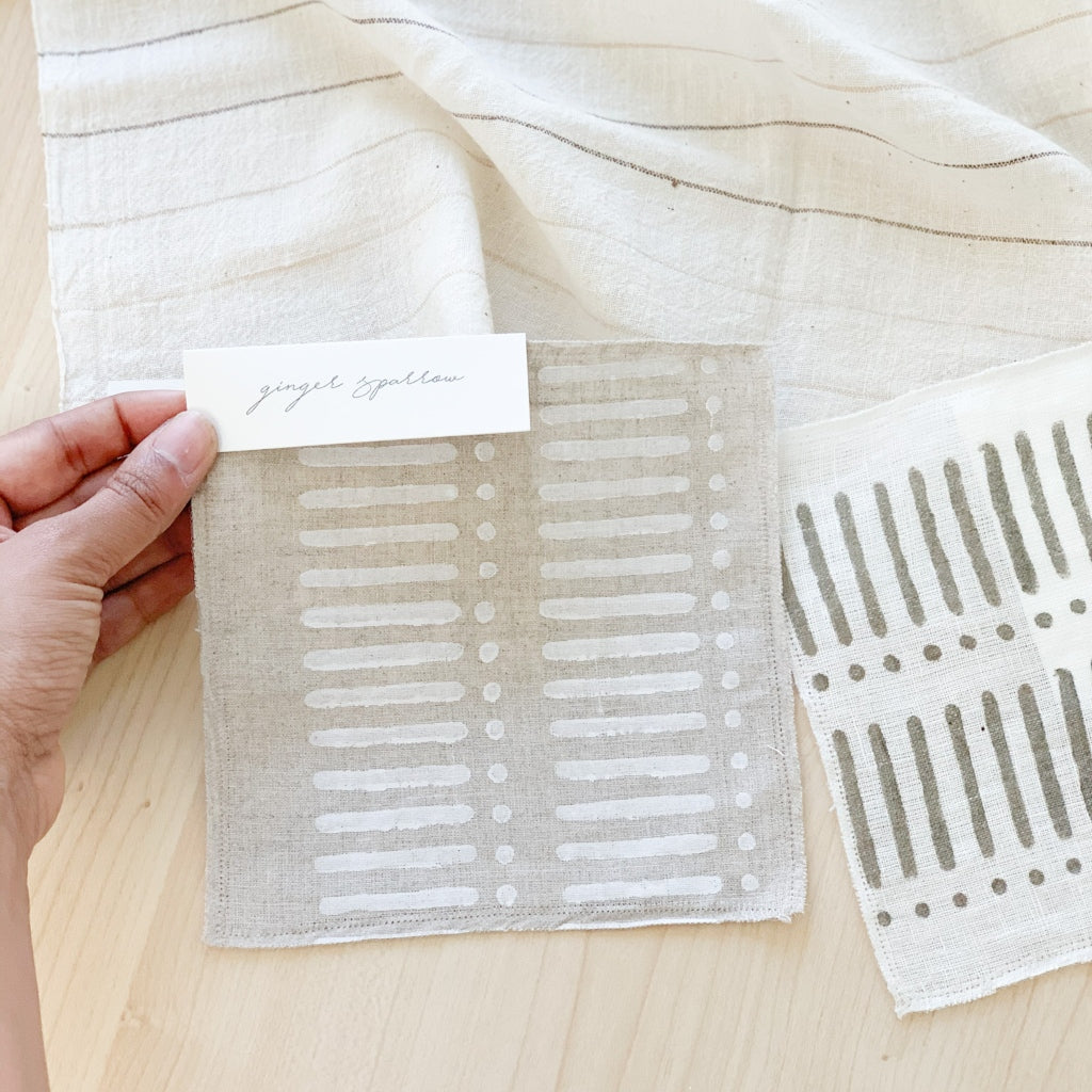 Hand block printed Textile by Ginger Sparrow, a modern home decor brand. Featuring a delicate floral pattern in three color options - olive grey, tan and pale blue. Light and airy its perfect for #throwpillows #drapes #livingroomdecor #bedroomideas #upholsteryfabric #fabricbytheyard