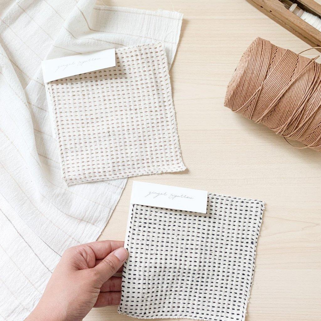 Handwoven Textile by Ginger Sparrow, a modern home decor brand. Featuring a charcoal black stripe pattern woven on a soft ivory ground. Light and airy its perfect for #throwpillows #drapes #livingroomdecor #bedroomideas